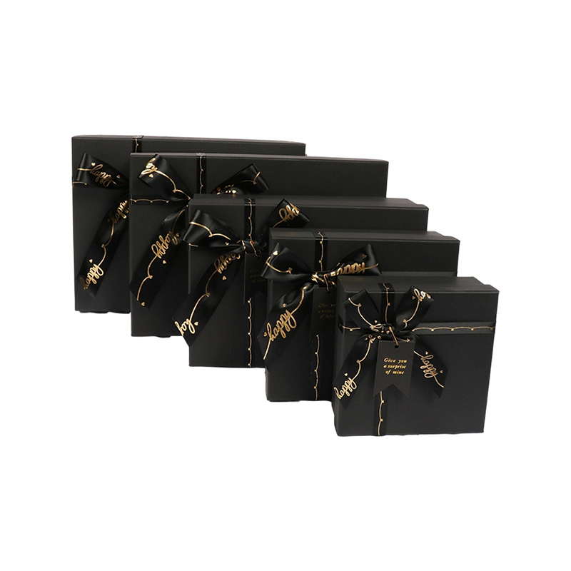 Elegante caja de regalo de cartón con lazo de cinta para perfumes y cosméticos 